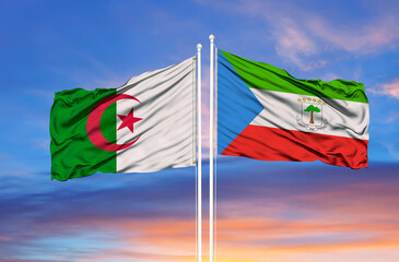Algeria and Equatorial Guinea two flags on flagpoles and blue cloudy sky