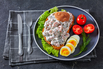 danish smorrebrod with shrimps, mayo, roe, and egg