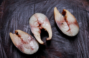 fresh fish on a wooden board
