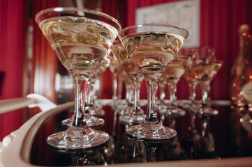 glasses of champagne are on the table at the party