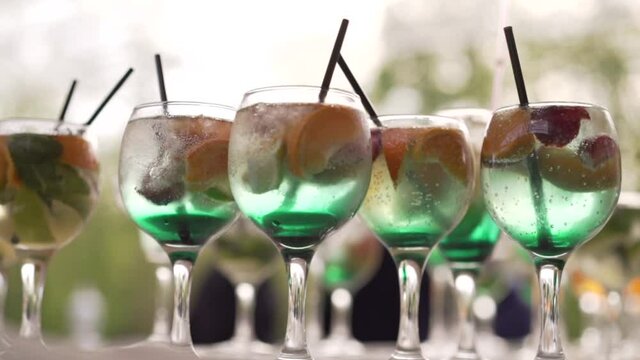 glasses with colorful cocktails. High quality FullHD footage