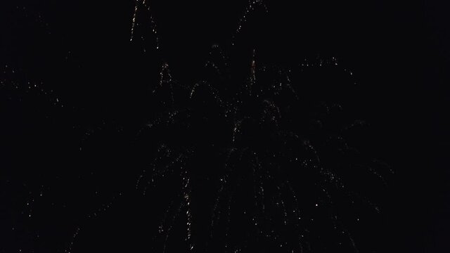Fireworks over the night sky. Close-up shooting from drone. High quality 4k footage