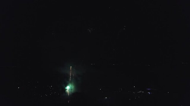 fireworks in the night sky shooting from the air. High quality 4k footage