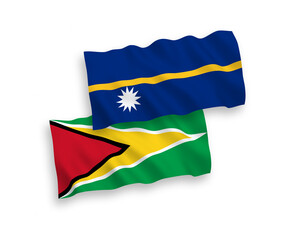 Flags of Co-operative Republic of Guyana and Republic of Nauru on a white background