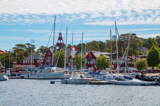 Marina in Sandham, Sweden, sailing boats, motor boats and buildings