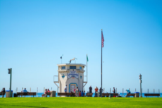 People by Lifeguard tower on a sunny day