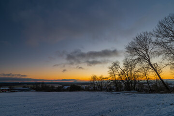 Sunrise near Ctibor and Halze villages in cold snowy morning