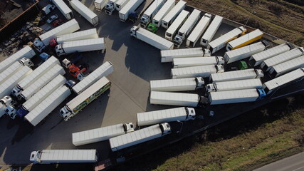 Aerial shot of a large truck parking lot, a logistics center for transporting goods across the country and abroad