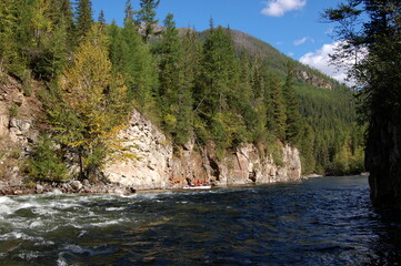 Catamaran  at the end of the canyon. Kyzyl-Khem river, Sayan Mountains, Russia.