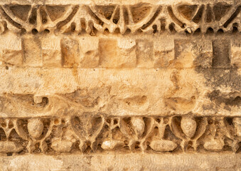 ancient weathered ornament on the ruins of a building in the ancient city of Mira, Turkey