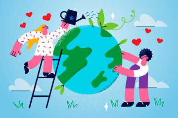 Obraz na płótnie Canvas Happy volunteers take care of planet earth 