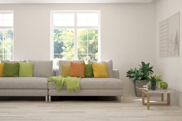 Fototapeta premium Minimalist living room in white color with sofa and summer landscape in window. Scandinavian interior design. 3D illustration