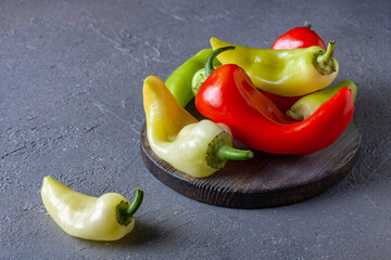 peppers on wood board, copy space