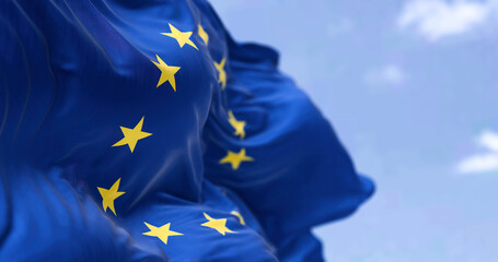 The flag of The European Union flapping in the wind - Powered by Adobe
