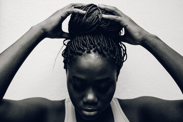 portrait of a black woman with braids