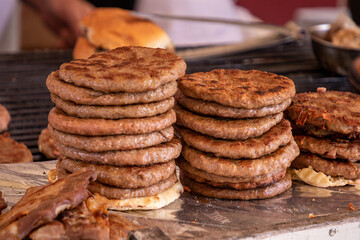Grilled hamburgers stack sold on market