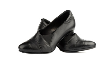 A pair of women's low-heeled shoes on a white background.