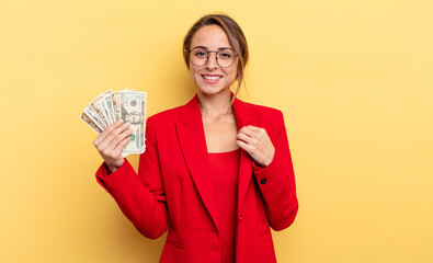 pretty woman looking arrogant, successful, positive and proud. business and dollar banknotes concept