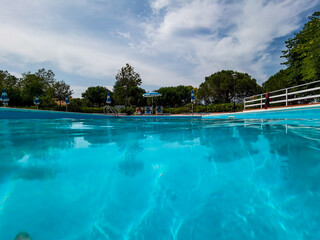 swimming pool in the tropical resort , picture taken in Porto Recanati, Macerata, Marche, Italy