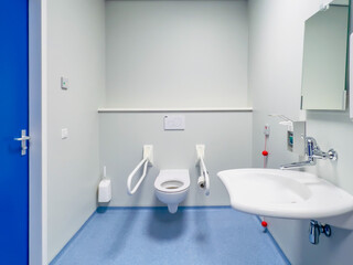Disability a bathroom and shower room adapted for wheelchair use.