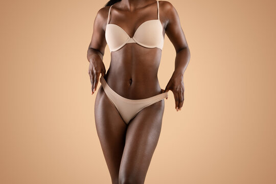 African american woman in underwear demonstrating her perfect body