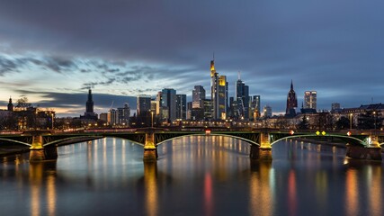 Fototapeta na wymiar River view at twilight of Frankfurt am Main in Germany.