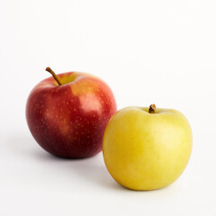 Yellow and red apples isolated on white background. Selective focus