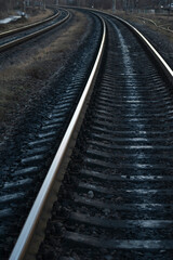Fototapeta na wymiar Rail branching. Railway close up. Rails for high-speed trains. Railway tracks with arrows and interchanges.