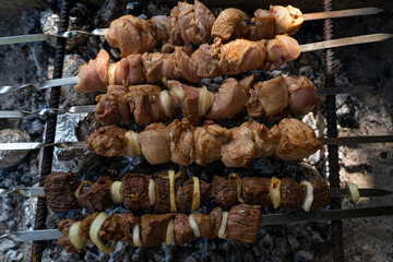 barbecuing on the charcoal grill