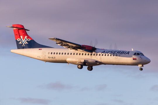 Air Serbia ATR-72 turboprop regional airliner landing in Vienna, Austria in beautiful morning light