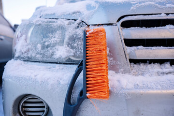 car brush-scraper for cleaning the car from snow and ice