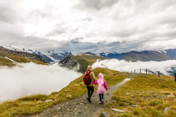 Fototapeta premium tourist girls mother and daughter and mountain views