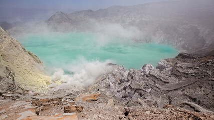 Volcano Ijen. View from above, stunning view of the Ijen volcano with the turquoise-coloured acidic crater lake.
