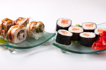 Salmon and tuna rolls. Vegetarian products and fish and rice, sea cabbage
