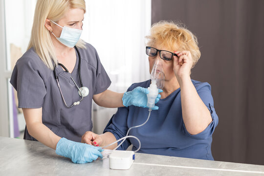 Elderly woman at doctor during coronavirus pandemic