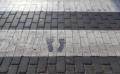 Footprints on zebra crossing