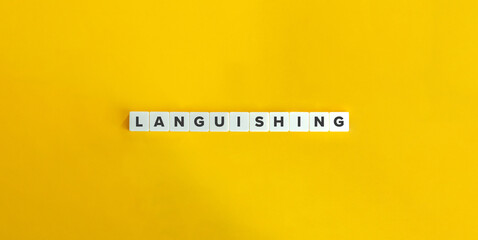 Languishing banner and word. Block letters on bright orange background.
