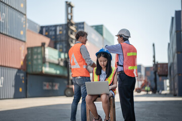 Asian girl working on laptop and sitting with workers operation at containers cargo area for shipping transport industrial. children playing in role of engineer career. student learn to be engineer.