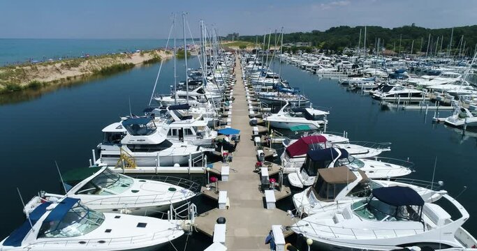 Aerial Shot of Lake Michigan Beach and Marina. Sail Boats, Sand, Pier, etc.