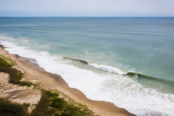 Hurricane Waves eroding a beach in New England