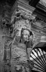 Barocco sculpture in Leccese stone on a column in Lecce, Italy