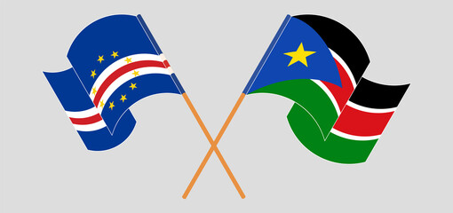 Crossed and waving flags of Cape Verde and South Sudan