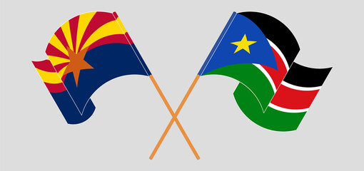 Crossed and waving flags of the State of Arizona and South Sudan