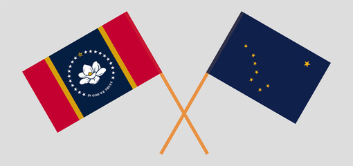 Crossed flags of The State of Mississippi and the State of Alaska. Official colors. Correct proportion