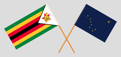 Crossed flags of Zimbabwe and the State of Alaska. Official colors. Correct proportion