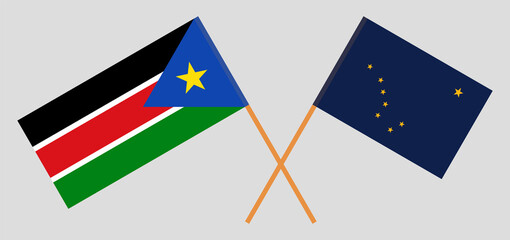 Crossed flags of South Sudan and the State of Alaska. Official colors. Correct proportion