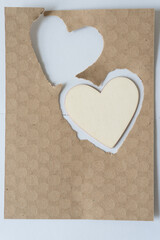 wooden heart and torn out heart