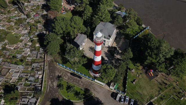 Drone is circling around a beautiful lighthouse in Poti, Georgia, historical, 4k