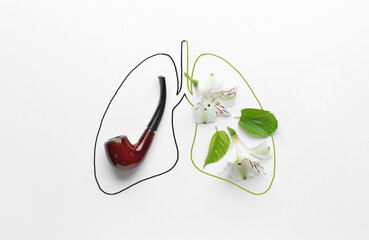 Lungs made of smoking pipe with flowers on white background