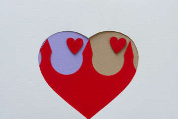 two hearts within a larger heart